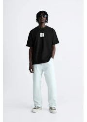 The Champ Clothing تي شيرت رجالي أسود كبير الحجم - رقبة دائرية، مكتوب عليه Syzygy