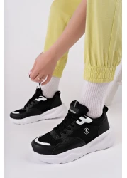 Moda Kadıköy حذاء رياضي نسائي باللون الأسود والأبيض لتقويم العظام