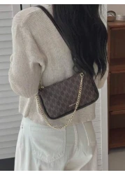 In 2024 The New Fashion Classic Joker Pu Waterproof Fabric Letter Pattern Printing Design Metal Chain Decoration Design Baguette Bag Shoulder Bag Is Suitable For Shopping