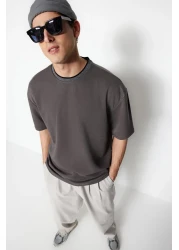  Collection تي شيرت بيكه مزخرف بشريط منسوج كبير الحجم/واسع القطع من أنثراسيت TMNSS23TS00079