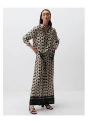 Jimmy Key بنطلون ساتان إكرو عالي الخصر - نمط هندسي