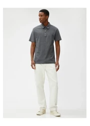 Koton تيشيرت بياقة بولو وأزرار بارزة الملمس وأكمام قصيرة