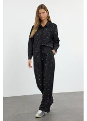  Modest بدلة صيفية من القماش المنفوش باللون الأسود اللامع مع تفاصيل حجرية قابلة للتعديل من الأسفل إلى الأعلى TCTAW25US00106