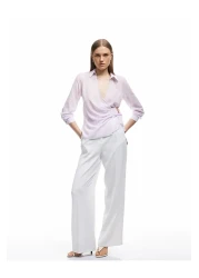 Koton بلوزة مزدوجة الصدر بأكمام طويلة وقصة غير متماثلة مع تفاصيل إكسسوارات معدنية