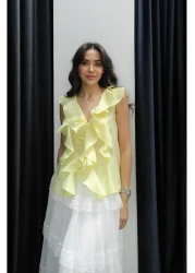 Havoş بلوزة صفرية بأكمام مكشكشة باللون الأصفر