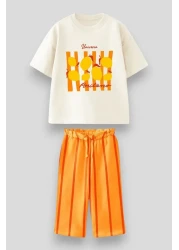 Magu Girls' Cotton Ecru Lemon Patterned "Unicorn Positano" Printed T-Shirt and Orange Striped Trousers