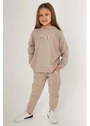 U.S. Polo Assn. بدلة رياضية كريمية للفتيات من يو اس بولو اسن