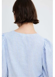 H&M بلوزة من مزيج الكتان