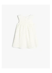 Koton ألف خط جولة الرقبة القوس الأزهار فستان بلا أكمام