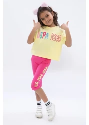 U.S. Polo Assn. طقم لباس ضيق برقبة دائرية للفتيات باللون الأصفر الفاتح