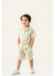 Magu بدلة صيفية للأولاد مكونة من قطعتين من الكتان بنسبة 100% - قميص بأكمام قصيرة وطبعة نخيل وخصر مطاطي