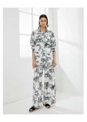 Koton قميص بأكمام طويلة وغطاء وجيب وأزرار من الفيسكوز