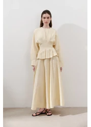 Manuka تنورة من الكتان واسعة القطع باللون الأصفر