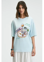 GRIMELANGE تي شيرت نسائي من NITZA مصنوع من القطن بنسبة 100% برقبة دائرية كبيرة الحجم باللون الأزرق