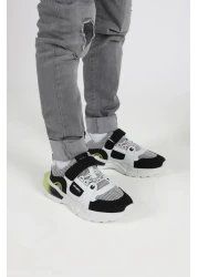 kids A more حذاء رياضي للأولاد من Unden بشريط فيلكرو مرن ومفصل باللون الأسود