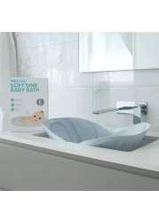 Frida Baby Soft Sink Baby Bath Seat Sink Bather for Baby Easy to Clean Baby Bathtub Bath Cushion That Supports Babys Head