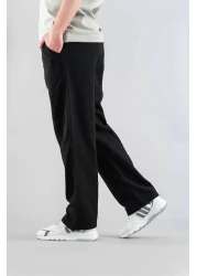 bombe بنطال رجالي أسود مريح بقصة ضيقة من الكتان بحزام من القماش الناعم