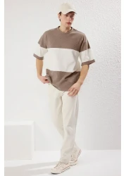  Collection تي شيرت حجري كبير الحجم مصنوع من القطن بنسبة 100% ومزخرف بألوان متعددة