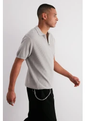  Collection إصدار محدود من تي شيرت محبوك بياقة بولو وسحاب ومخرم بقصة عادية TMNSS24PO00001