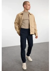  Collection بنطال قماش تشينو بقصة ضيقة باللون الأزرق الداكن TMNAW23PL00034