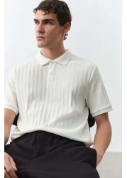 H&M قميص بولو جيرسي منسوج بقصّة Slim Fit