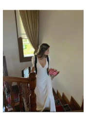 FMN Moda تنورة بأكمام واسعة ورقبة على شكل حرف V - مع تفاصيل فيونكة وخياطة