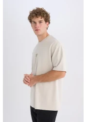 Defacto تي شيرت Boxy Fit برقبة دائرية وأكمام قصيرة من القماش الثقيل D5517AX25SP