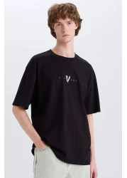 Defacto تي شيرت 100% قطن الفايكنج فالهالا بوكسي بياقة دائرية وطباعة خلفية وأكمام قصيرة E3277AX25SM