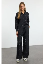  Modest بدلة صيفية من القماش المنفوش باللون الأسود اللامع مع تفاصيل حجرية قابلة للتعديل من الأسفل إلى الأعلى TCTAW25US00106