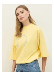 Styli Oversized Dropped Shoulder Embroidered Slogan T-Shirt