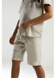 U.S. Polo Assn. بدلة برمودا كريمية للأولاد