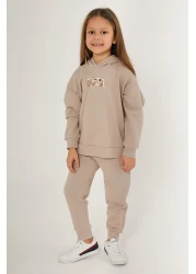 U.S. Polo Assn. بدلة رياضية كريمية للفتيات من يو اس بولو اسن