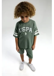 U.S. Polo Assn. بدلة برمودا كاكي للأولاد من US Polo Assn