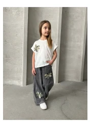 Minigimin Cicileri طقم بناتي مكون من قطعتين من Miniğimin Cicileri مع بنطال جينز بتفاصيل زنبق - أنثراسايت