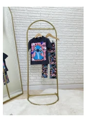 Lolliboomkids طقم تي شيرت كبير الحجم مطبوع عليه شخصية فتاة وبنطال ضيق ملون من الأسفل