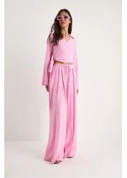 Bianco Lucci بلوزة نسائية برباط على شكل حرف V وجيب وخصر مطاطي وبنطلون فضفاض 60283324