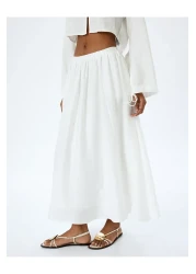 Koton تنورة طويلة واسعة بخصر عالٍ مع جيوب مبطنة