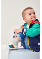 Next Baby حذاء للأولاد باللون الأبيض بألوان قوس قزح وشريط ملمس سريع ونعل لتقويم العظام