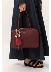 Manuka حقيبة سيمونا كلاريت باللون الأحمر