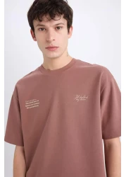 Defacto تي شيرت Boxy Fit برقبة دائرية لا يحتاج إلى كي وقابل للتنفس وأكمام قصيرة مطبوعة من القماش الثقيل E0574ax