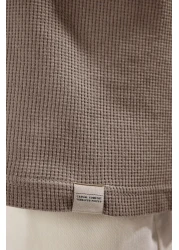  Collection تي شيرت حجري كبير الحجم مصنوع من القطن بنسبة 100% ومزخرف بألوان متعددة