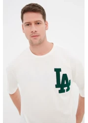  Collection تي شيرت قطني كبير الحجم مطرز من Ecru Süzene City - TMNSS22TS2268