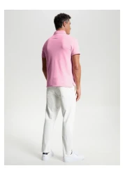 Tommy Hilfiger تيشيرت بولو رجالي بأكمام قصيرة من تومي هيلفيغر باللون الوردي عام ١٩٨٥