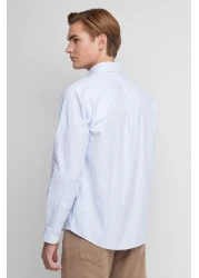 BROOKS BROTHERS قميص رجالي باللون الأزرق الفاتح بدون حديد بقصة عادية وقصة واسعة غير حديدية