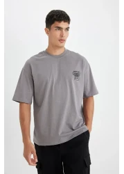 Defacto تي شيرت رمادي كبير الحجم للرجال - رقبة دائرية، طباعة خلفية، قطن، كم قصير D4908ax24au