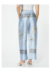 Koton بنطلون ساتان منقوش بالزهور - ساق واسعة وخصر مطاطي