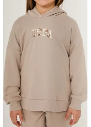 U.S. Polo Assn. بدلة رياضية كريمية للفتيات من يو اس بولو اسن