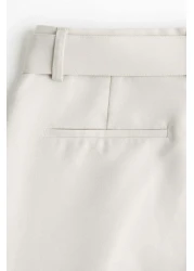 H&M Belted tailored trousers