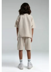 Rolypoly بدلة برمودا كريمية للأولاد