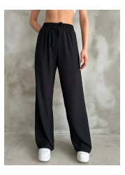 Giyimsel بنطلون بالازو بخصر مطاطي أسود للسيدات